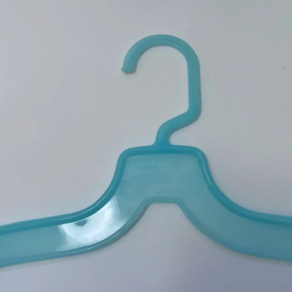 Vintage Plastic Hanger Swirl Blue USA